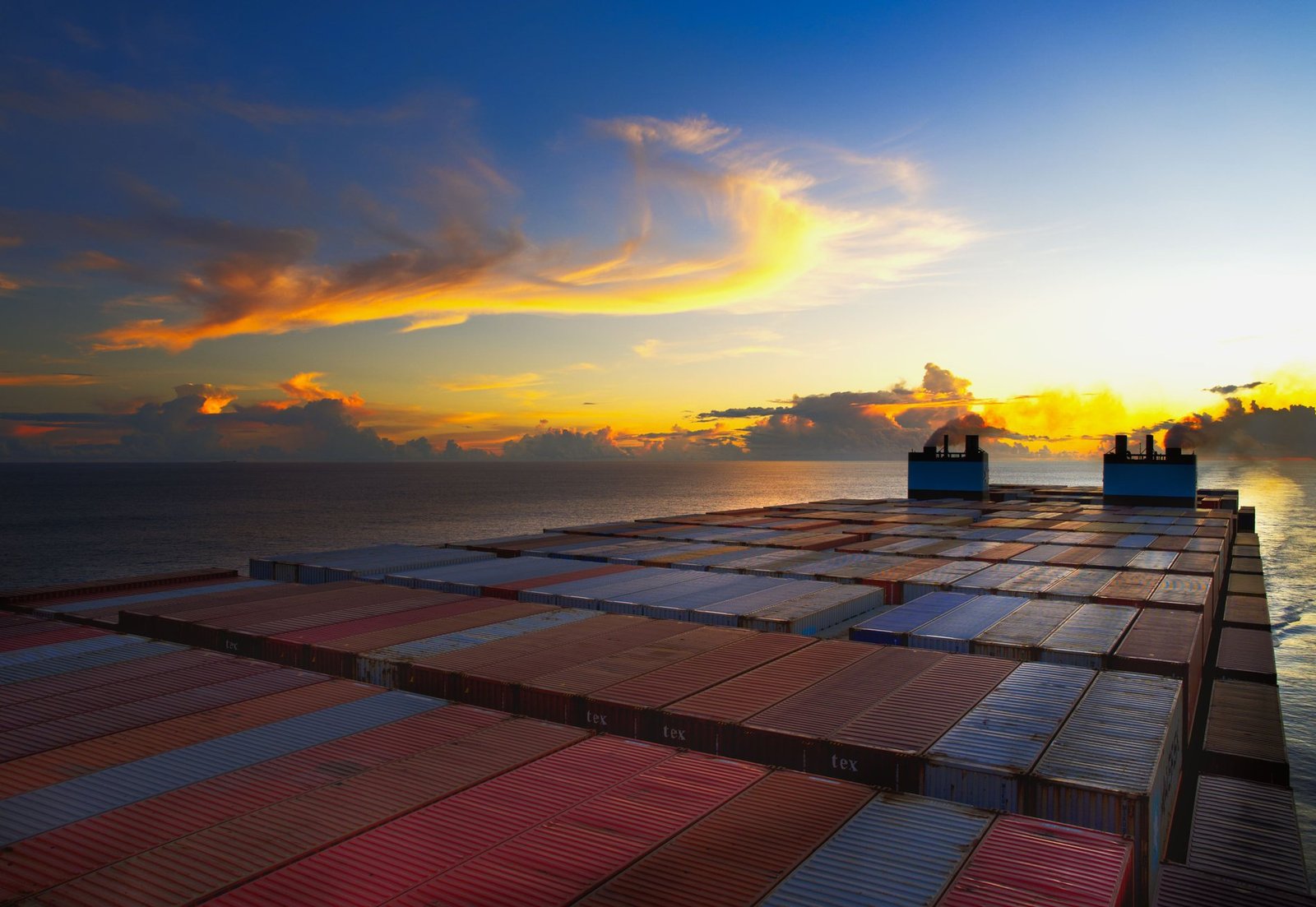 Container ship at sunset